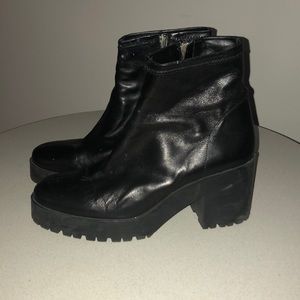 Black combat high heel boots